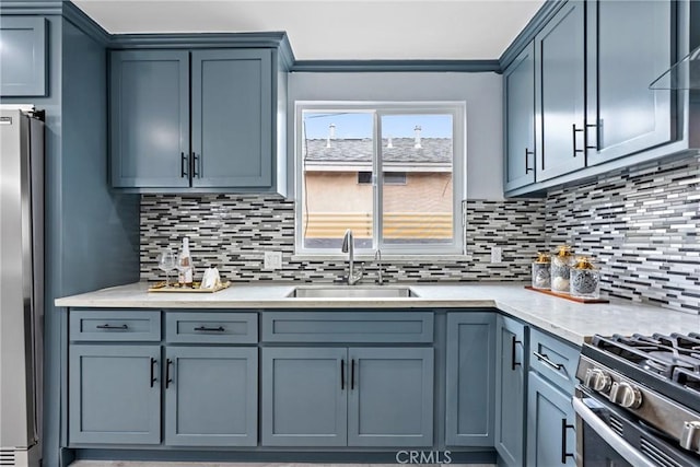 7321 Eglise Ave, Pico Rivera, CA 90660 - kitchen with a sink, stainless steel appliances, backsplash, range hood, and crown molding