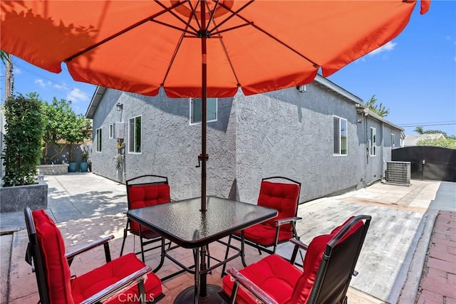 7321 Eglise Ave, Pico Rivera, CA 90660 - view of patio featuring outdoor dining area and cooling unit