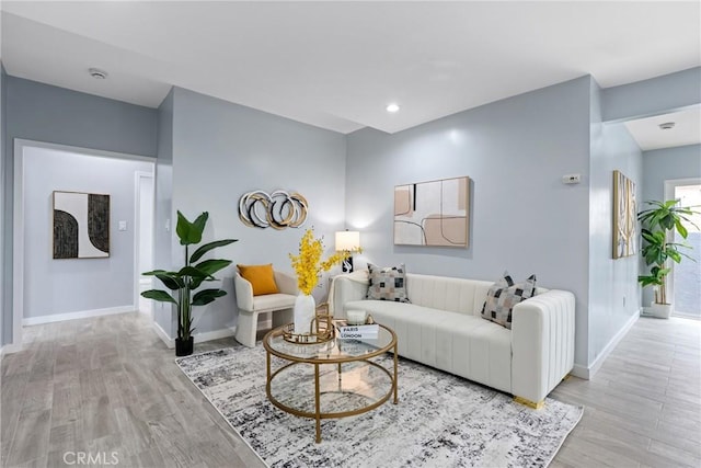 7321 Eglise Ave, Pico Rivera, CA 90660 - living area with light wood finished floors and baseboards