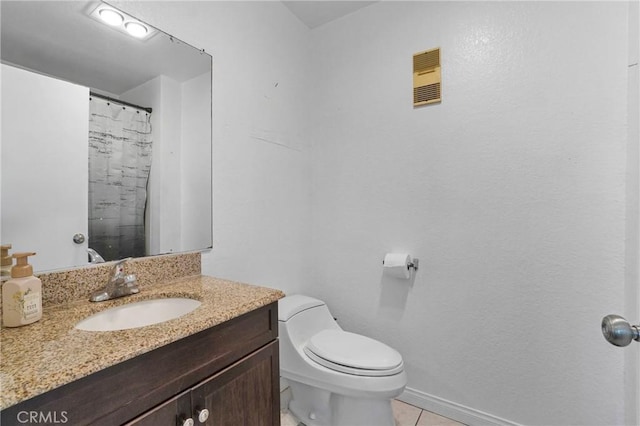 9414 Moonbeam Ave Unit 18, Panorama City, CA 91402 - full bath featuring vanity, tile patterned flooring, toilet, and a shower with shower curtain