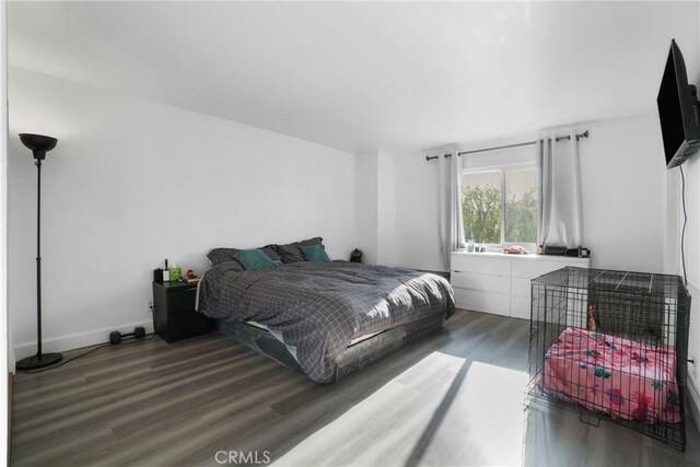 9414 Moonbeam Ave Unit 18, Panorama City, CA 91402 - bedroom featuring wood finished floors