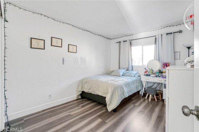 9414 Moonbeam Ave Unit 18, Panorama City, CA 91402 - bedroom with wood finished floors and baseboards