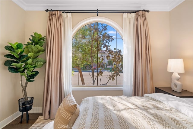74 Gainsboro, Irvine, CA 92620 - bedroom featuring crown molding, baseboards, and wood finished floors