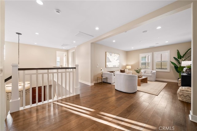 74 Gainsboro, Irvine, CA 92620 - living area with hardwood / wood-style flooring, baseboards, and recessed lighting