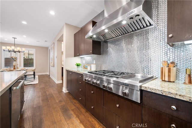 74 Gainsboro, Irvine, CA 92620 - kitchen featuring ventilation hood, appliances with stainless steel finishes, baseboards, dark wood-type flooring, and decorative backsplash