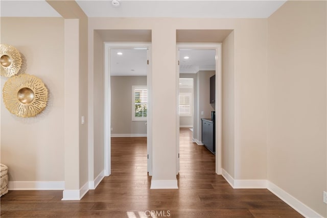 74 Gainsboro, Irvine, CA 92620 - hall featuring dark wood-style floors and baseboards