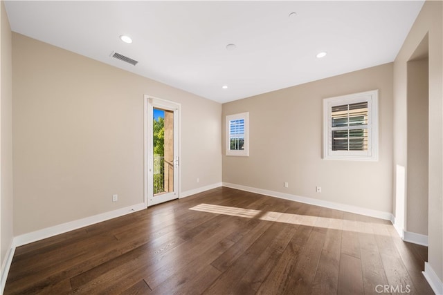 74 Gainsboro, Irvine, CA 92620 - spare room with dark wood-style floors, baseboards, and recessed lighting