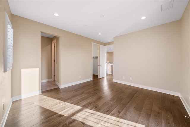 74 Gainsboro, Irvine, CA 92620 - unfurnished room featuring wood finished floors, baseboards, and recessed lighting