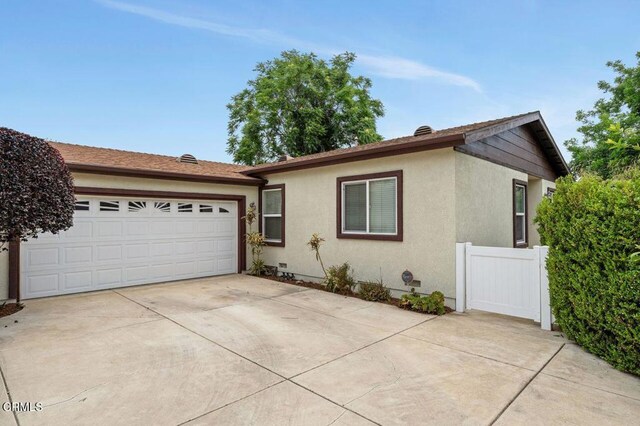 260262 Acacia St, Altadena, CA 91001 - ranch-style home with driveway, stucco siding, and a garage