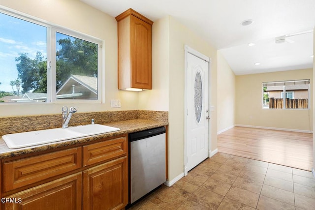 260262 Acacia St, Altadena, CA 91001 - kitchen with stainless steel dishwasher, a sink, baseboards, light tile patterned floors, and recessed lighting