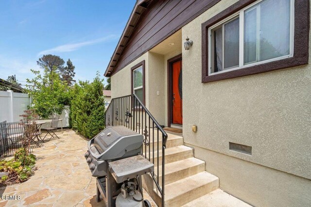 260262 Acacia St, Altadena, CA 91001 - doorway to property with a patio area, stucco siding, and crawl space
