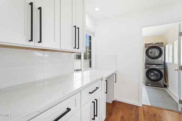 260262 Acacia St, Altadena, CA 91001 - washroom with stacked washer / dryer, baseboards, dark wood finished floors, and recessed lighting