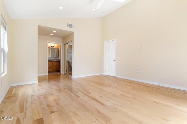 260262 Acacia St, Altadena, CA 91001 - empty room with lofted ceiling, light wood-style floors, baseboards, healthy amount of natural light, and recessed lighting