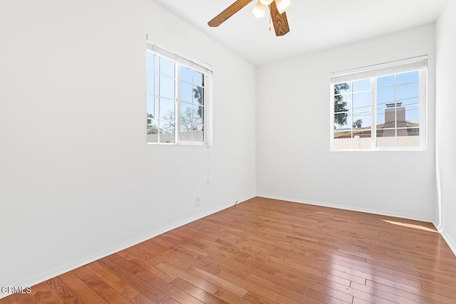 260262 Acacia St, Altadena, CA 91001 - empty room featuring hardwood / wood-style flooring, ceiling fan, and baseboards
