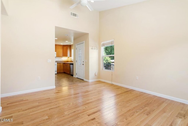 260262 Acacia St, Altadena, CA 91001 - unfurnished living room with a ceiling fan, light wood-style floors, baseboards, a high ceiling, and recessed lighting
