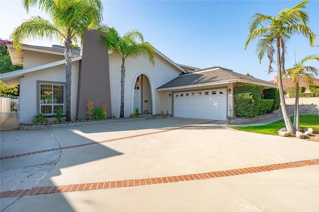 22443 Robin Oaks, Diamond Bar, CA 91765 - view of front of property with stucco siding, concrete driveway, and a garage