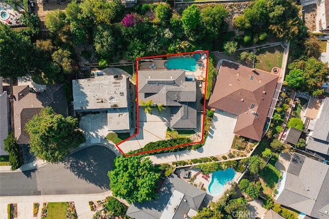 22443 Robin Oaks, Diamond Bar, CA 91765 - aerial view of residential area with a pool and property boundaries highlighted