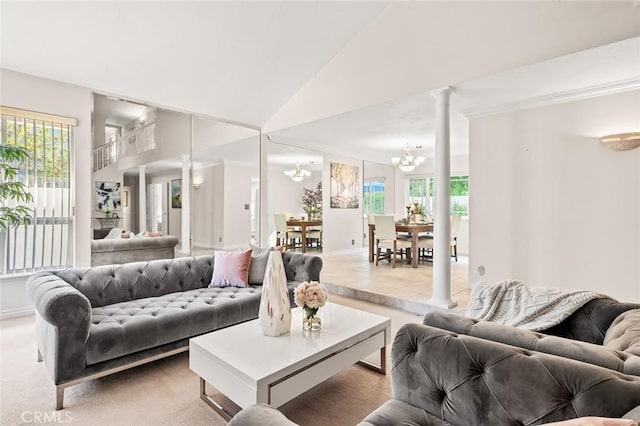 22443 Robin Oaks, Diamond Bar, CA 91765 - living room with a chandelier, decorative columns, baseboards, and lofted ceiling