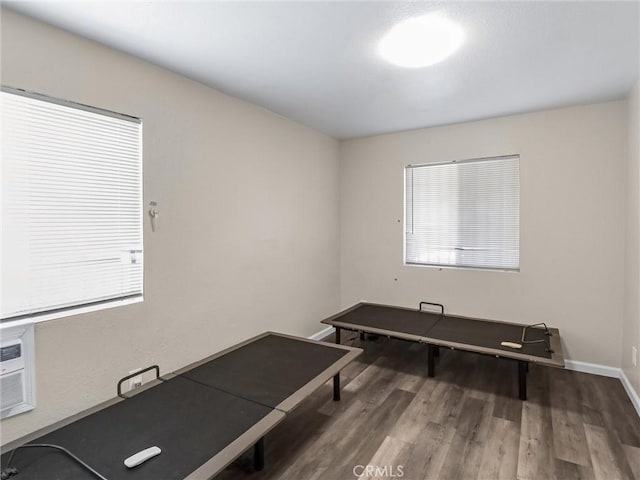 119 W 61st St, Los Angeles, CA 90003 - exercise area with wood finished floors and baseboards