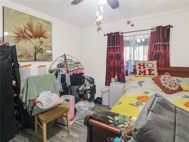 119 W 61st St, Los Angeles, CA 90003 - bedroom with a ceiling fan and wood finished floors