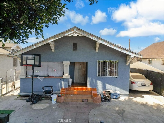 119 W 61st St, Los Angeles, CA 90003 - view of front of house with stucco siding