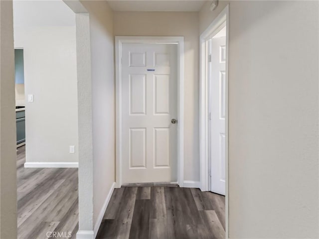 119 W 61st St, Los Angeles, CA 90003 - hallway featuring wood finished floors and baseboards