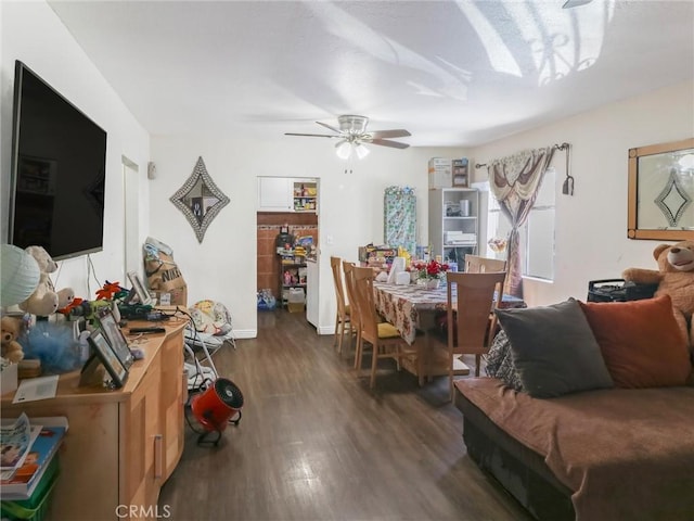 119 W 61st St, Los Angeles, CA 90003 - living area featuring wood finished floors, a ceiling fan, and baseboards