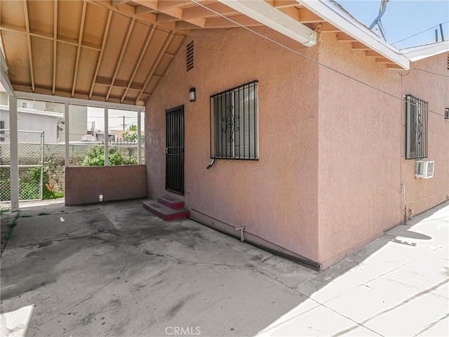 119 W 61st St, Los Angeles, CA 90003 - view of side of home with entry steps and stucco siding
