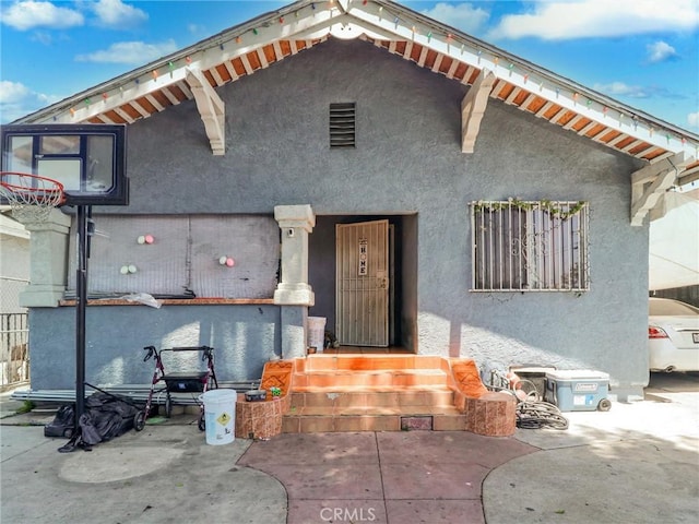 119 W 61st St, Los Angeles, CA 90003 - view of front of property featuring stucco siding