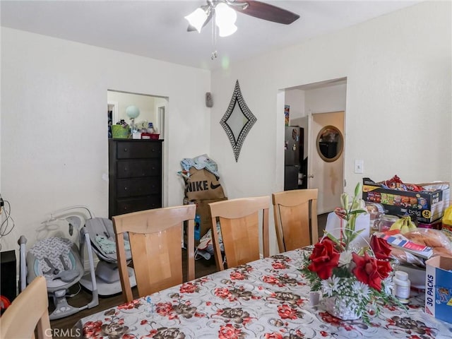 119 W 61st St, Los Angeles, CA 90003 - dining room featuring a ceiling fan