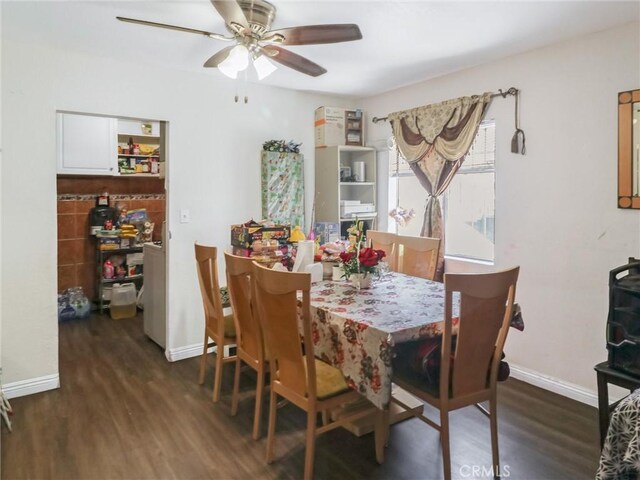 119 W 61st St, Los Angeles, CA 90003 - dining space with wood finished floors, ceiling fan, and baseboards