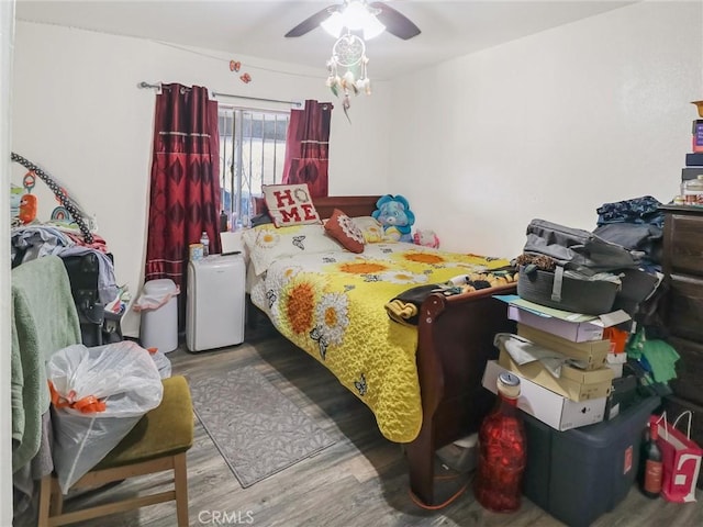 119 W 61st St, Los Angeles, CA 90003 - bedroom with wood finished floors and ceiling fan