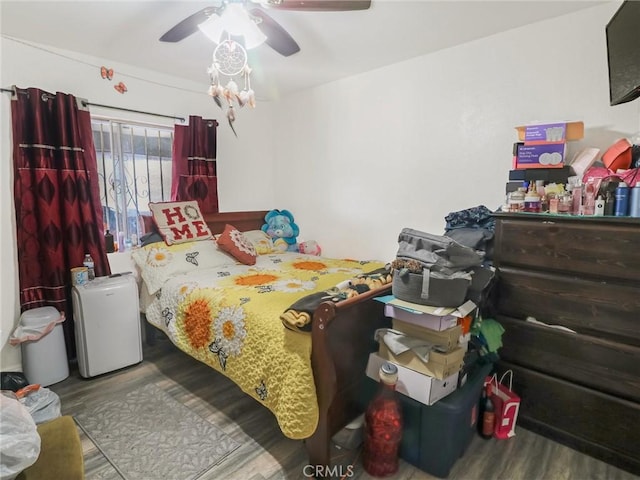 119 W 61st St, Los Angeles, CA 90003 - bedroom with wood finished floors and ceiling fan