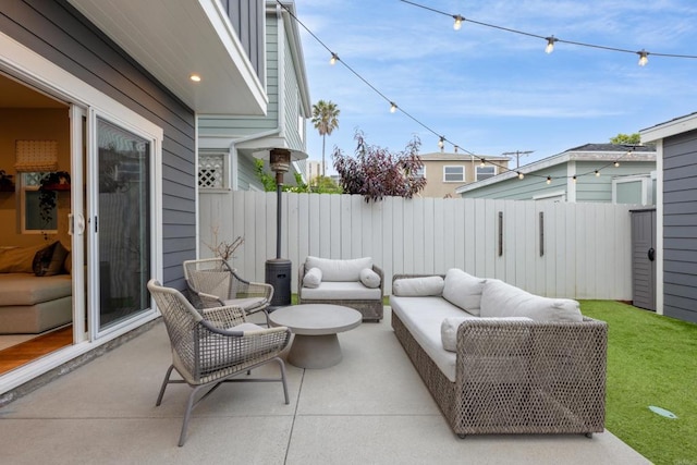 867 Wilbur Ave, San Diego, CA 92109 - fenced backyard with an outdoor living space and a patio