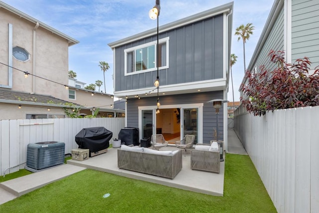 867 Wilbur Ave, San Diego, CA 92109 - rear view of house featuring board and batten siding, central AC unit, an outdoor living space, and a fenced backyard