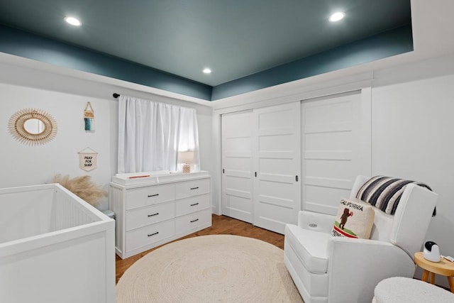867 Wilbur Ave, San Diego, CA 92109 - bedroom with recessed lighting, a closet, a nursery area, and wood finished floors