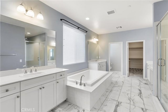 41719 Wayladn Ct, Lancaster, CA 93536 - full bath with marble look tiles, a stall shower, vanity, a garden tub, and recessed lighting