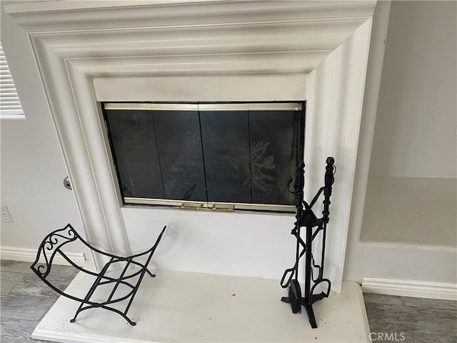 28227 Cobbler Ct, Menifee, CA 92585 - detailed view of baseboards and wood finished floors