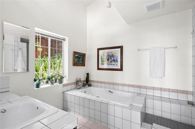 790 Wendt Ter, Laguna Beach, CA 92651 - bathroom with a garden tub, a sink, and tile patterned floors