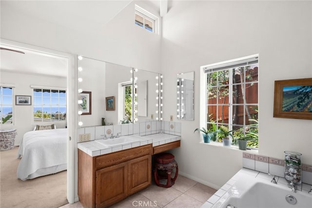 790 Wendt Ter, Laguna Beach, CA 92651 - full bathroom with vanity, healthy amount of natural light, and a towering ceiling