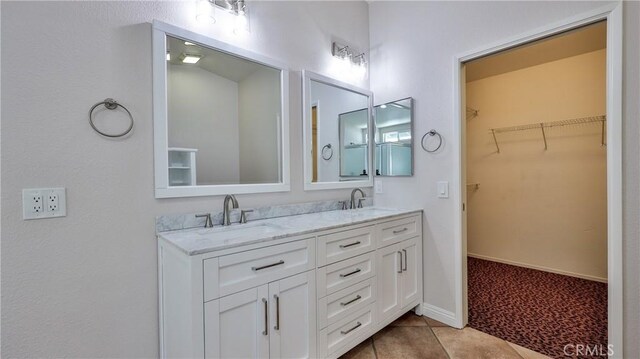 22820 Lark St, Grand Terrace, CA 92313 - full bath with double vanity, tile patterned flooring, and a spacious closet