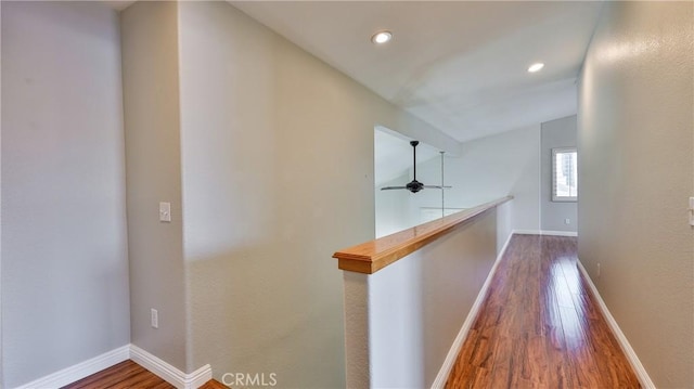 22820 Lark St, Grand Terrace, CA 92313 - hallway featuring wood finished floors, an upstairs landing, recessed lighting, and baseboards