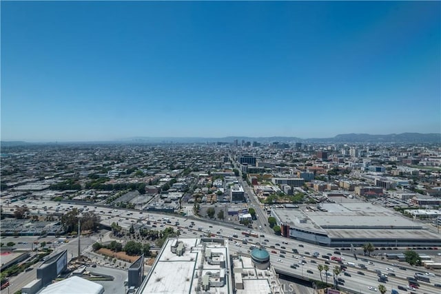 900 W Olympic Blvd Unit 34F, Los Angeles, CA 90015 - view of urban area featuring a mountainous background and a major roadway