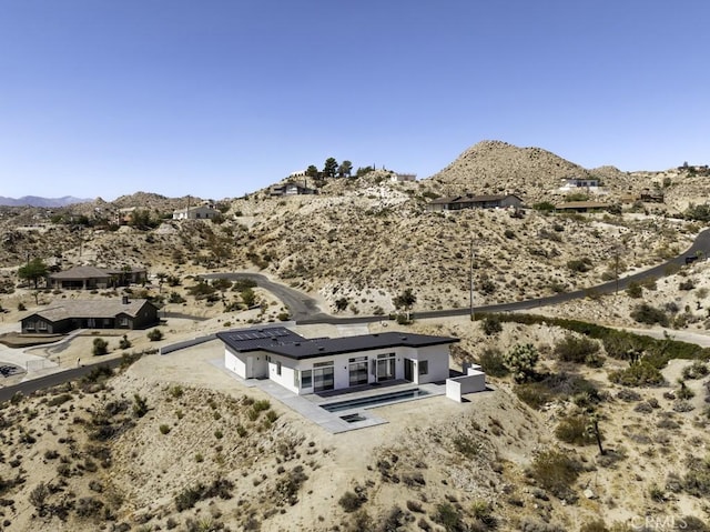 6197 Mandarin Rd, Yucca Valley, CA 92284 - rear view of house featuring a desert view and a mountain view