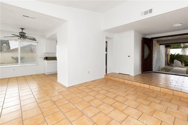 10709 Calabash Ave, Fontana, CA 92337 - spare room featuring ceiling fan, baseboards, and light tile patterned floors