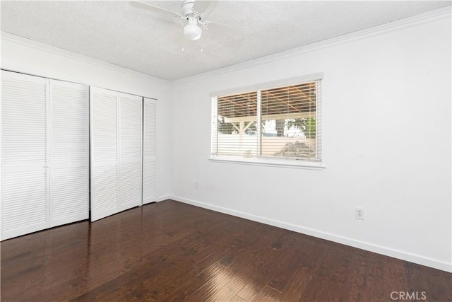 10709 Calabash Ave, Fontana, CA 92337 - unfurnished bedroom with crown molding, dark wood finished floors, baseboards, a closet, and a textured ceiling