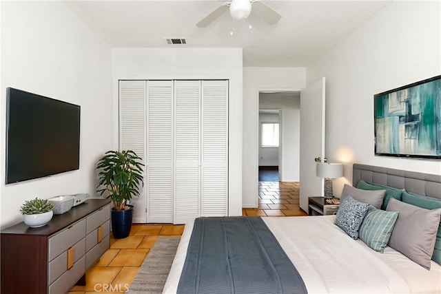10709 Calabash Ave, Fontana, CA 92337 - bedroom with light tile patterned flooring, a closet, and ceiling fan