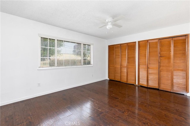 10709 Calabash Ave, Fontana, CA 92337 - unfurnished bedroom with two closets, baseboards, and wood finished floors