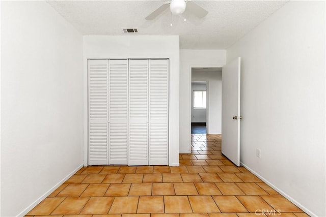 10709 Calabash Ave, Fontana, CA 92337 - unfurnished bedroom featuring a closet, baseboards, and a ceiling fan