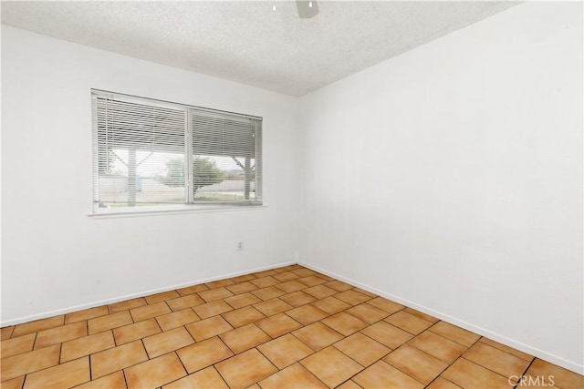 10709 Calabash Ave, Fontana, CA 92337 - spare room with a textured ceiling and baseboards